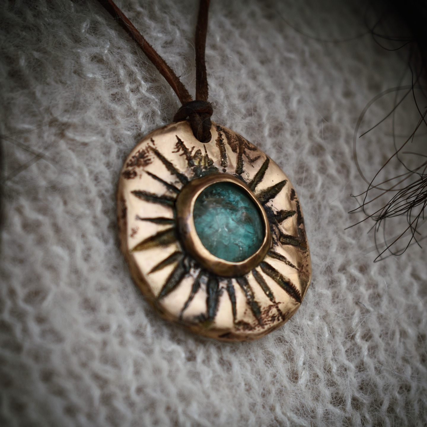 Bronze pendant with antique glass