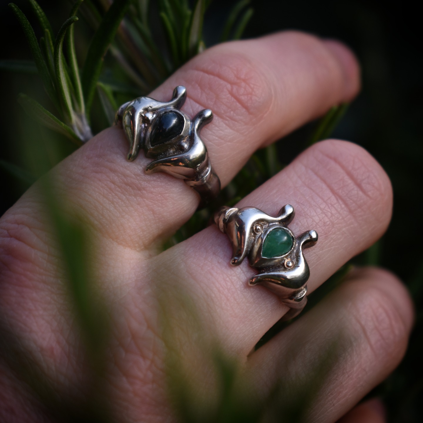 Silver rings with sapphire and emerald